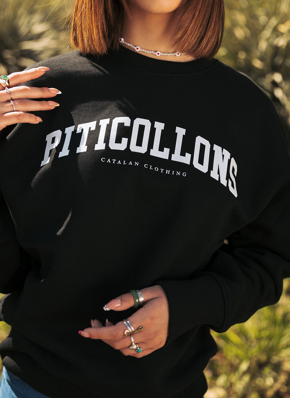 Dessuadora negra Pit i Collons